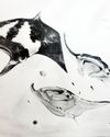 A pencil drawing of 3 large manta rays swimming through the sunny sea.